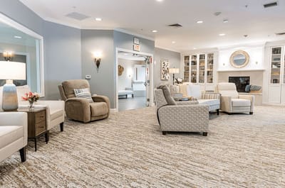 Bright common area with comfortable seating and decor