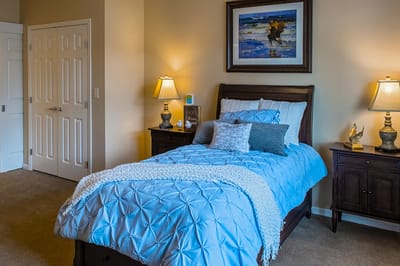 Cozy private room with a bed and decor