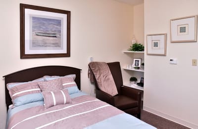 Cozy private room featuring a bed and decor