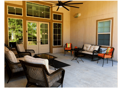 Outdoor seating area with chairs and table