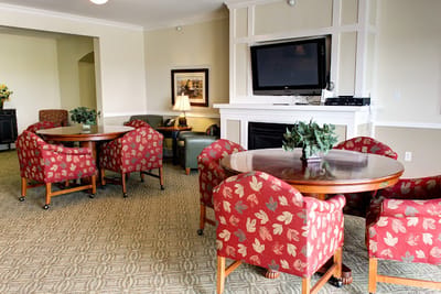 Interior common area with seating and TV