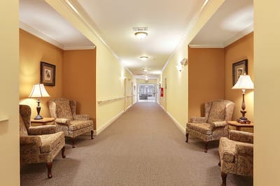 Bright hallway with seating areas and decor