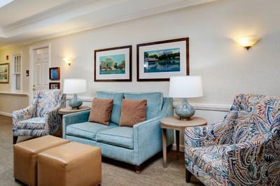 Bright common area with sofas and artwork