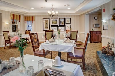 Dining area set for a meal with elegant decor