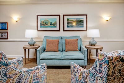 Cozy common area with seating and artwork