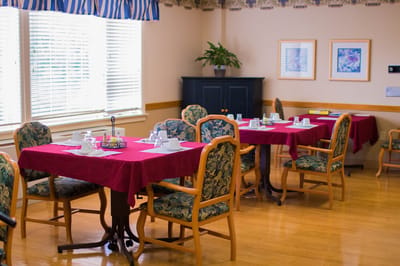 Cozy dining room with neatly set tables