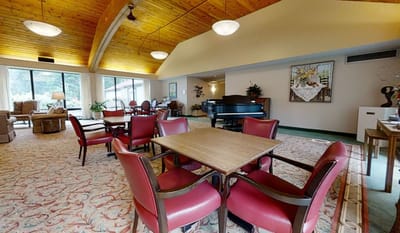 Interior common area with seating and piano