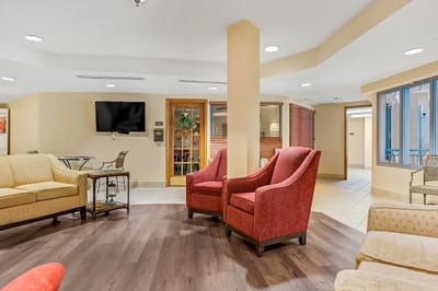 Interior common area with seating and TV
