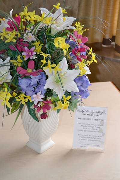 Flower arrangement with a sign for counseling staff.