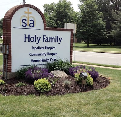 Sign for Holy Family Inpatient Hospice facility.