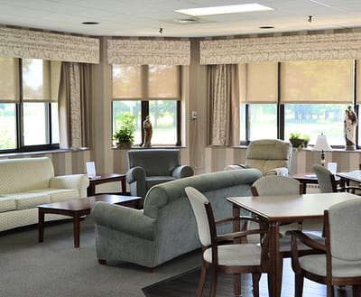 Comfortable common area with seating and natural light.