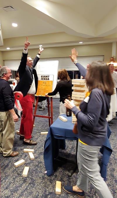 Residents enjoying a game of giant Jenga.