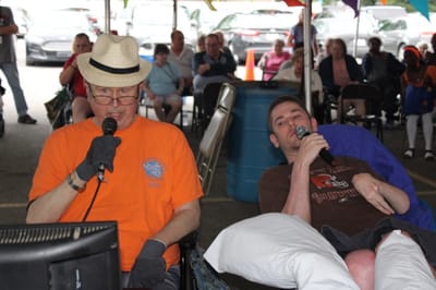 Residents engaging in an outdoor activity performance.