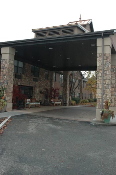 Covered entrance of the senior living facility