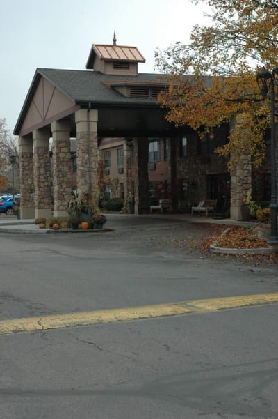 Exterior view of the facility entrance with landscaping