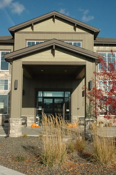 Exterior view of the facility entrance with landscaping