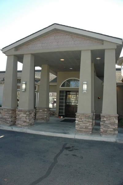 Building entrance with decorative pillars
