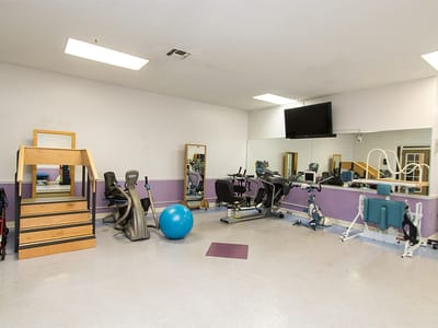 Well-equipped exercise room with gym equipment