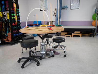 Interior view of a therapy room with equipment