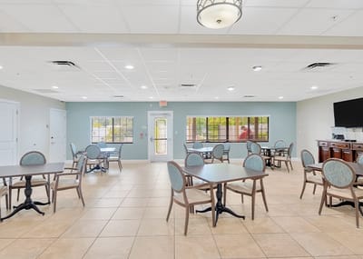 Bright dining area with tables and chairs