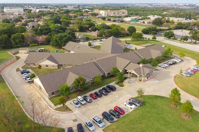 Aerial view of the facility and parking area