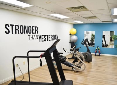 Interior view of a fitness room with exercise equipment