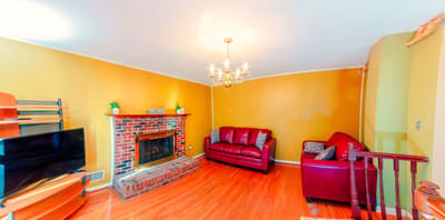 Cozy living room with a fireplace and seating