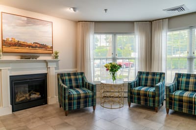Cozy common area with comfortable seating and a fireplace