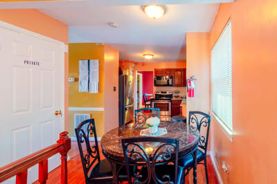 Dining area with a round table and chairs