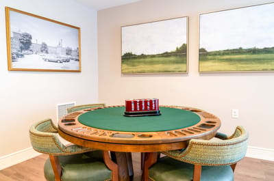 Interior common area with a gaming table