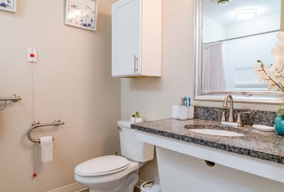 Clean bathroom with modern fixtures and decor