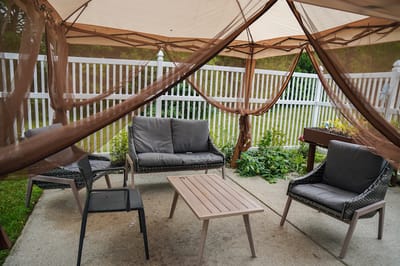 Outdoor seating area with shaded canopy