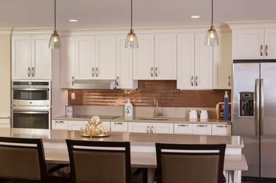 Bright and modern kitchen interior with white cabinets