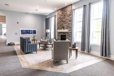 Comfortable lounge area with seating and natural light