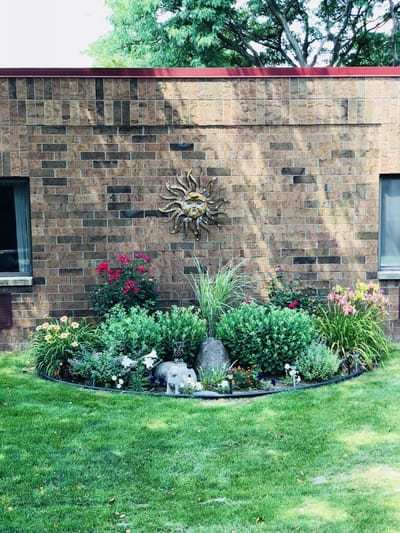 A well-maintained garden outside the facility