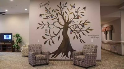Decorative tree mural with family photos