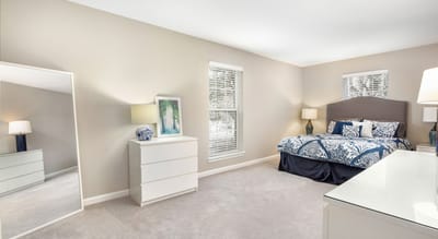 Brightly lit interior of a resident's bedroom