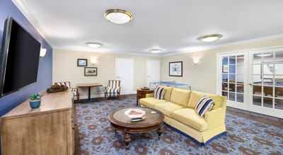 Bright common area with seating and decor