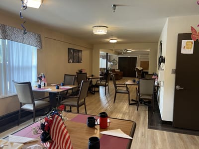 Common area with dining tables and decor