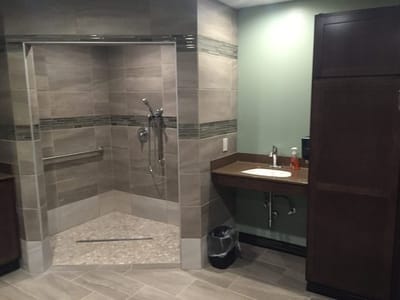Accessible bathroom with shower and sink area