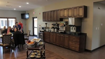 Residents enjoying a meal in a dining area