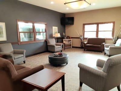 Common area with seating in a senior living facility