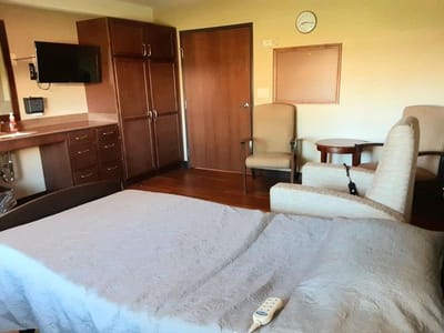 Cozy interior of a resident's room with furniture