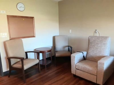 Seating area with two chairs and a table