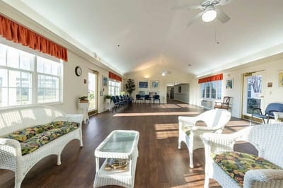 Bright common area with seating and windows