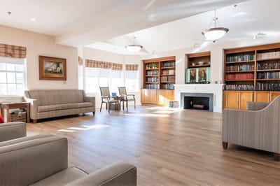Bright and inviting common area with bookshelves