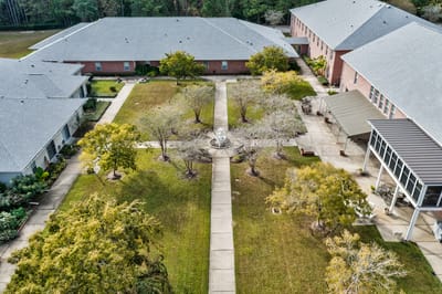 Aerial view of a courtyard with trees and pathways