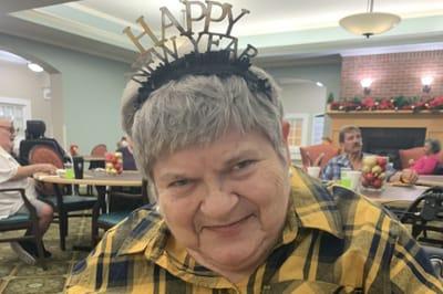 Resident celebrating New Year in a common area