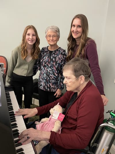 Residents enjoying a music session together in a common area