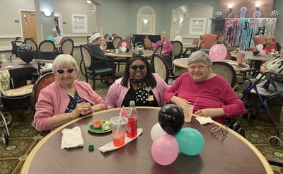 Residents enjoying snacks during a social event
